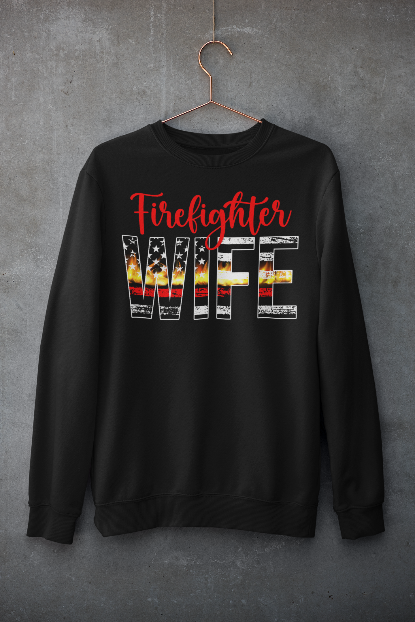 Black sweatshirt with 'Firefighter Wife' text on a hanger against a gray background