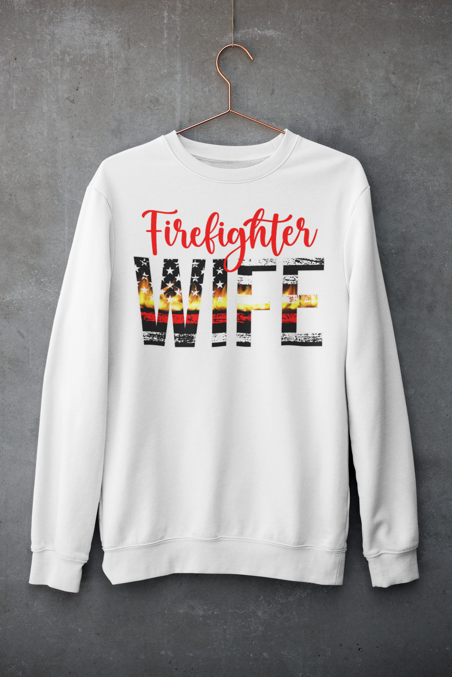 White sweatshirt with 'Firefighter WIFE' text and American flag design on a gray background