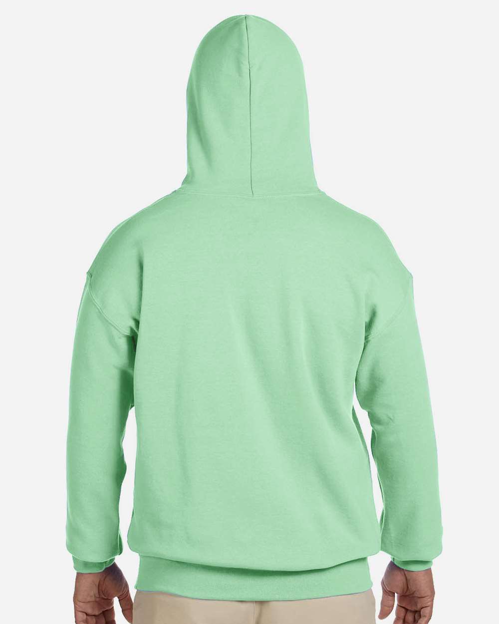 Light green hoodie worn by a person on a white background