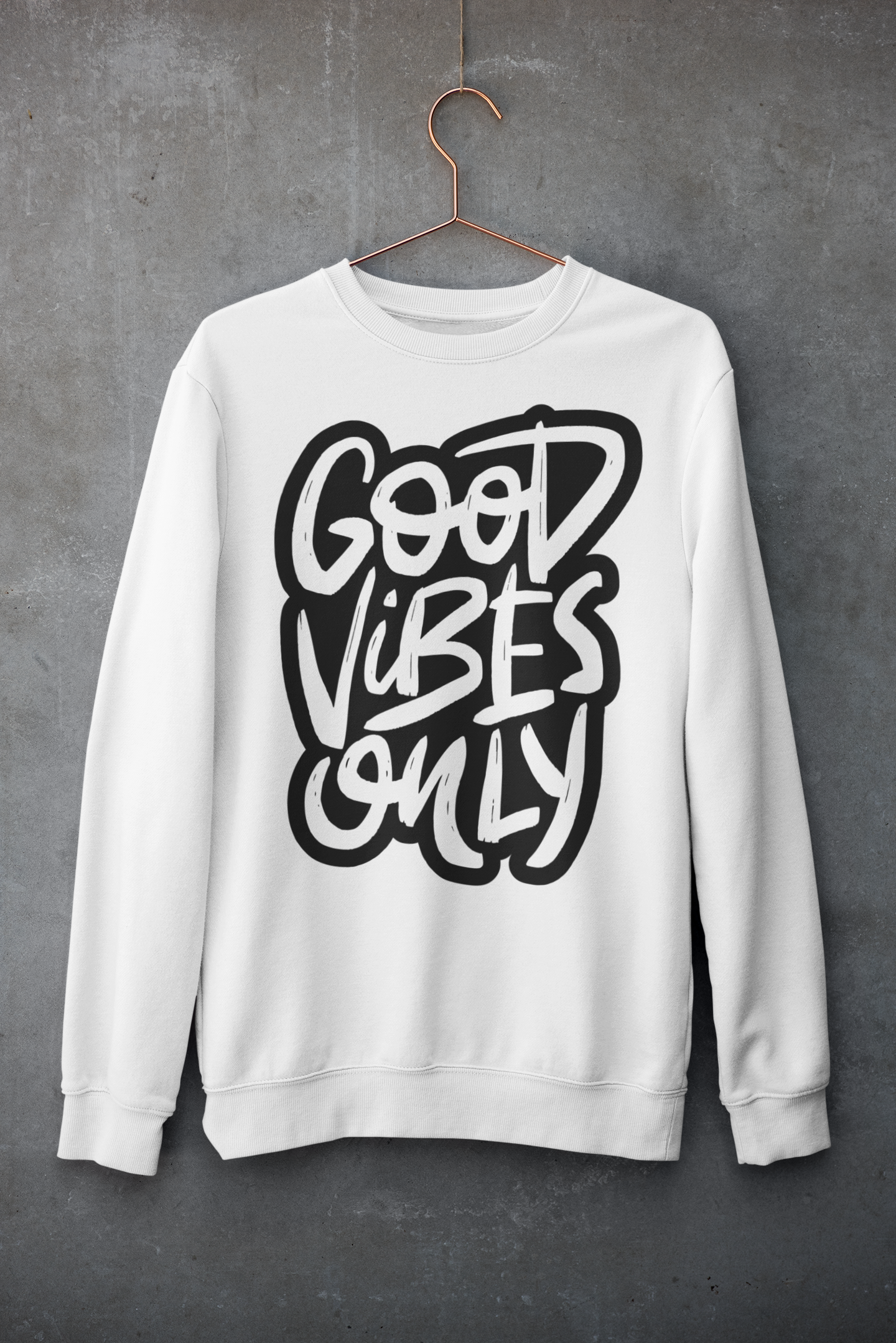 White sweatshirt with 'Good Vibes Only' text on a gray background