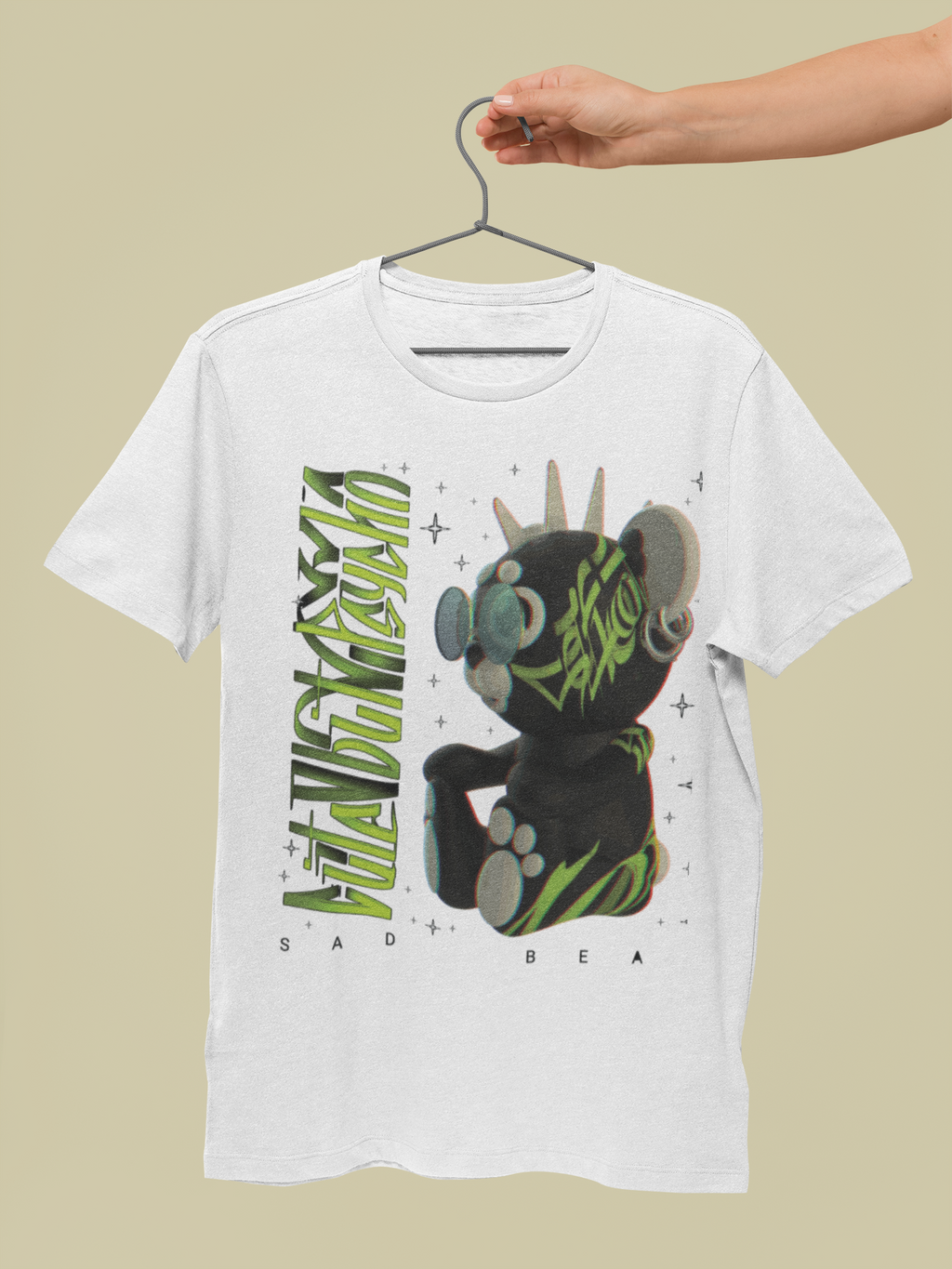 White t-shirt with graphic design and text on a beige background