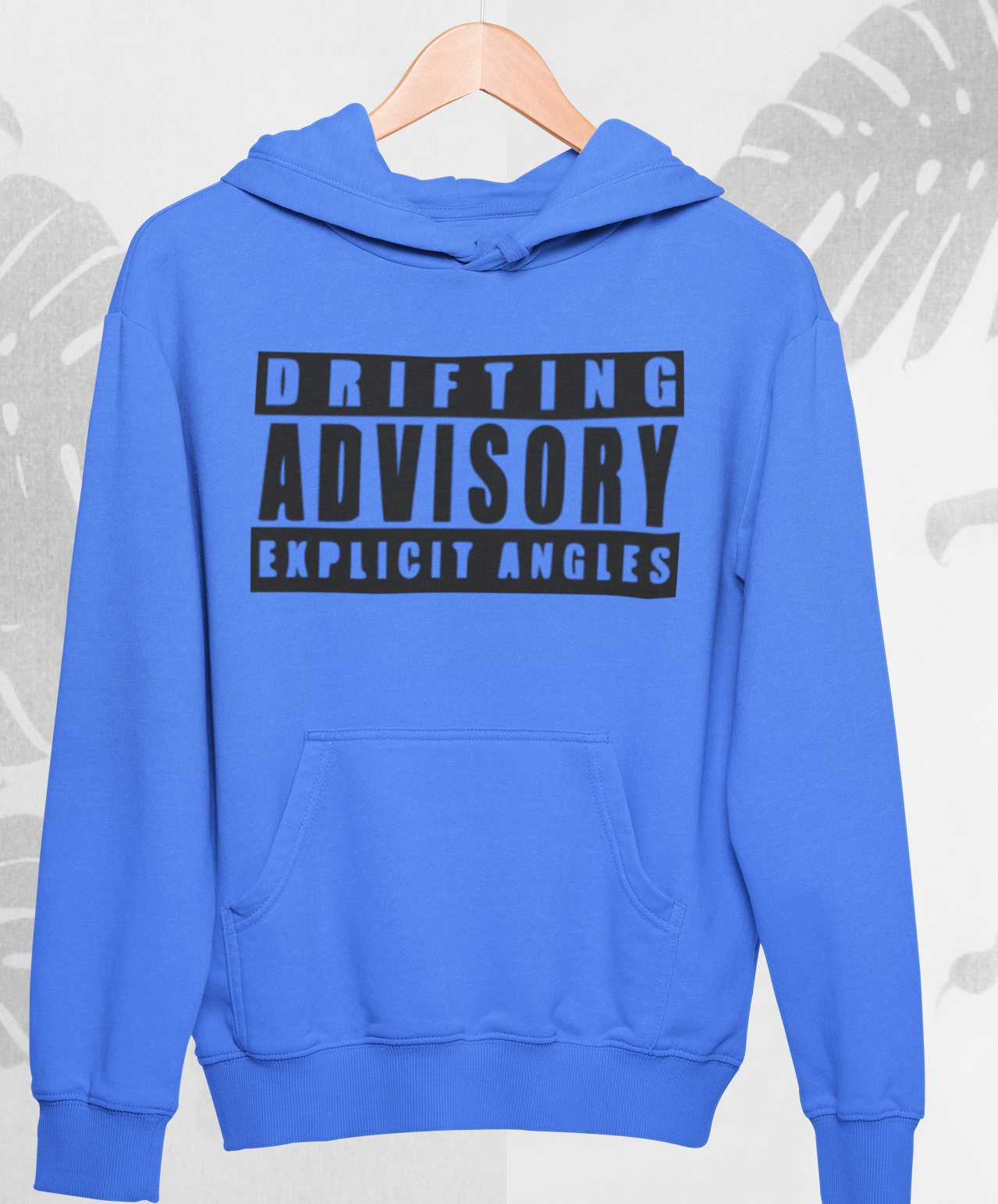 Blue hoodie with text on a hanger against a light gray background with leaf patterns