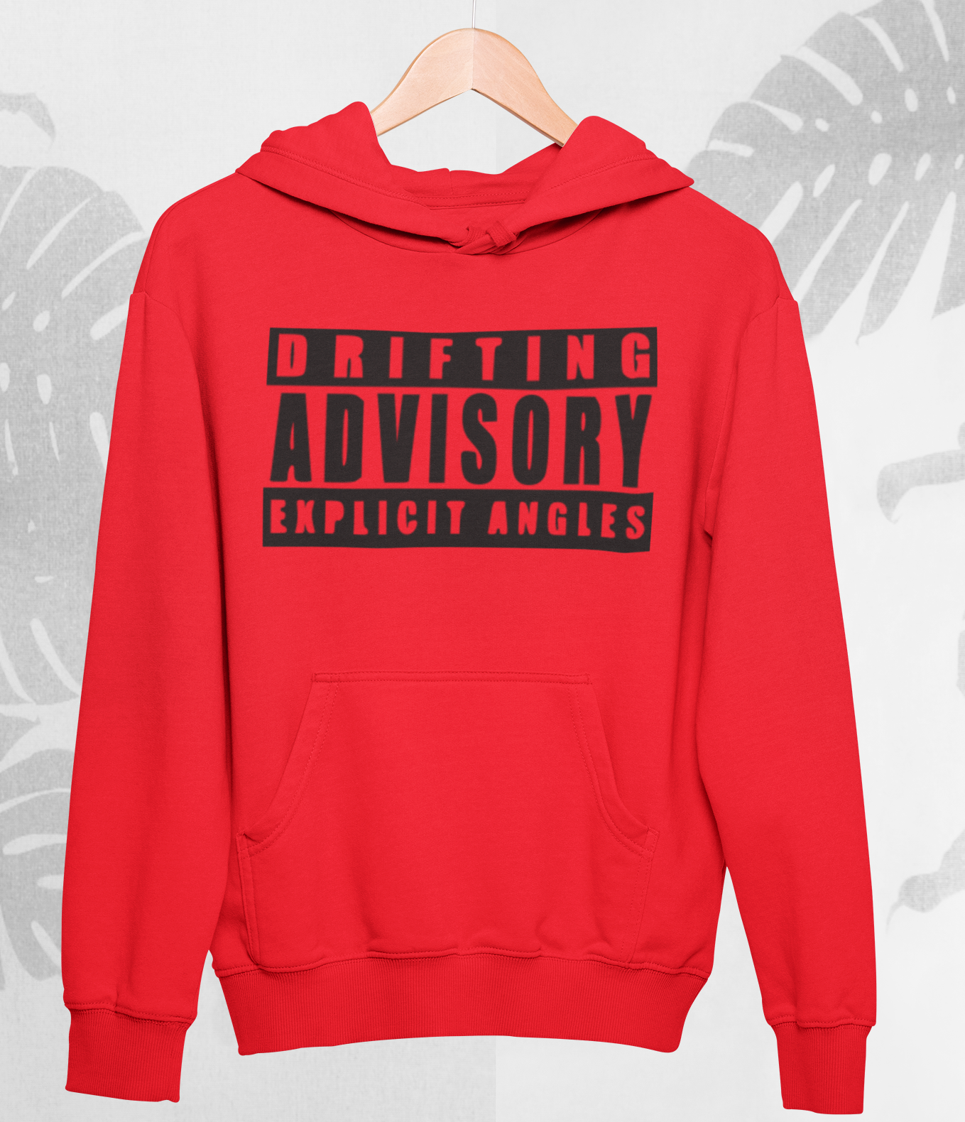 Red hoodie with black text on a hanger against a light gray background with leaf patterns.