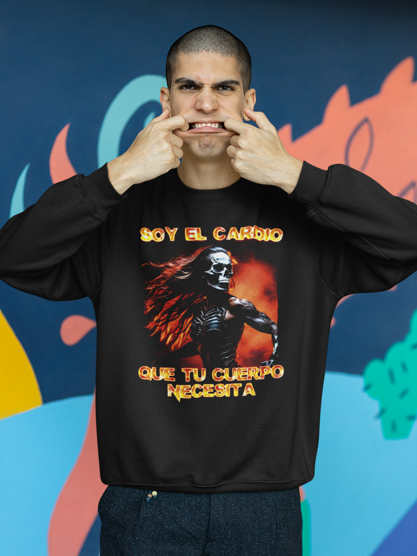 Person wearing a black sweatshirt with graphic design and text against a colorful abstract background