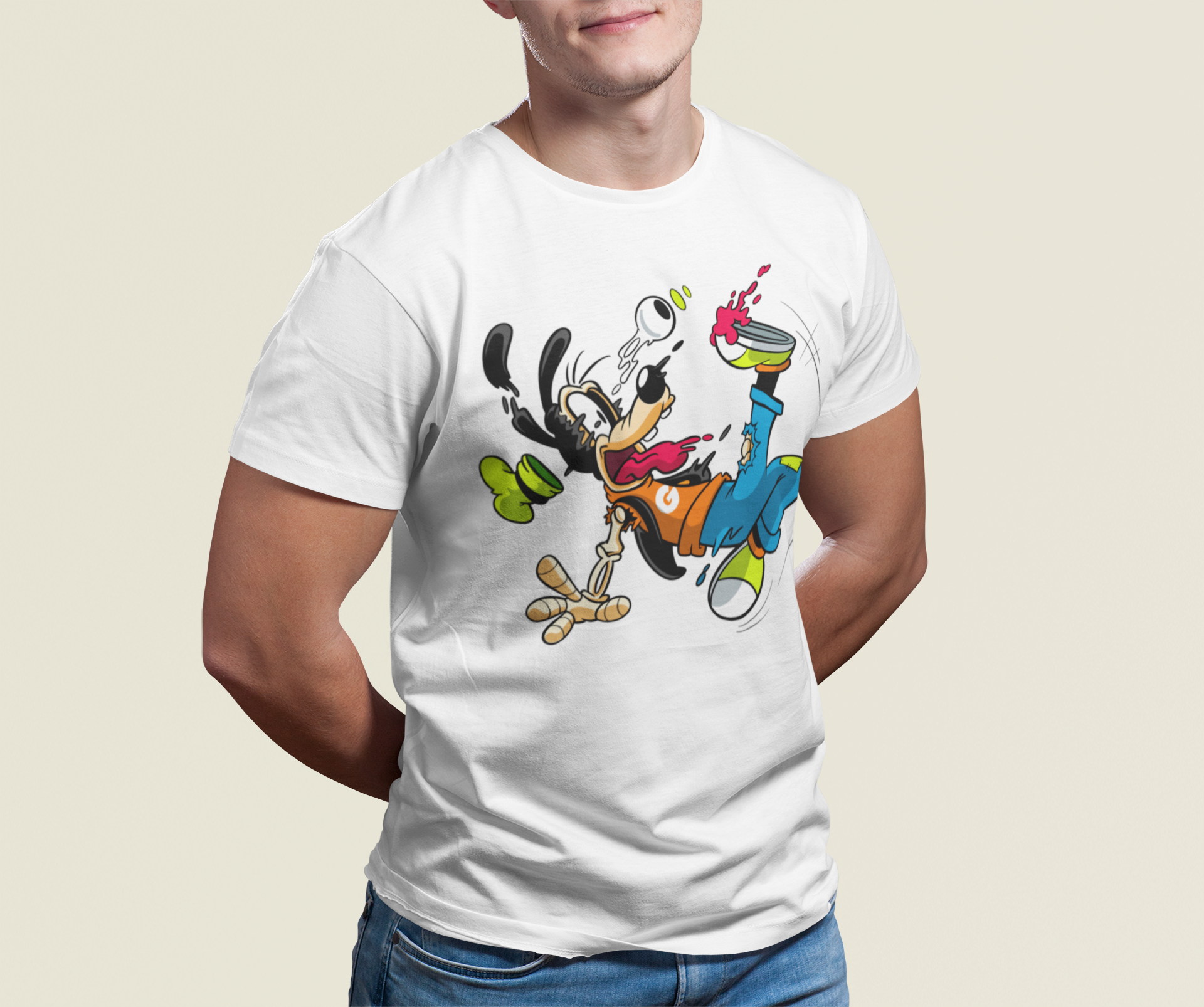 Person wearing a white t-shirt with a colorful graphic design on a beige background